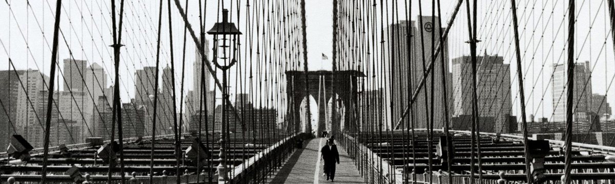 Brooklyn Bridge walkway in black and white