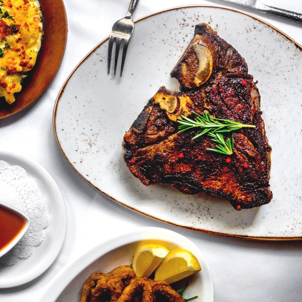 Grilled steak plated at 212 Steakhouse