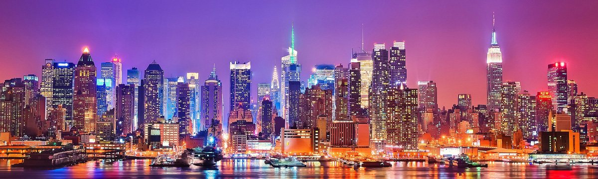 Manhattan skyline at night viewed across the East River
